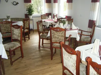 Ein Restaurant oder anderes Speiselokal in der Unterkunft Ferienwohnungen Birkenhof