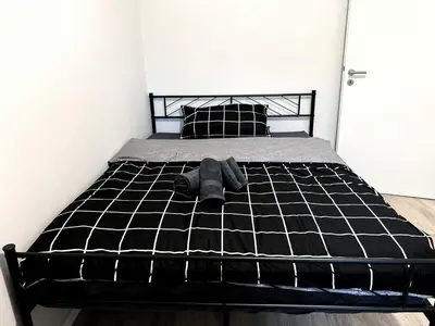 Ein Bett oder Betten in einem Zimmer der Unterkunft HolidayHome Apartments I Cozy Private Room