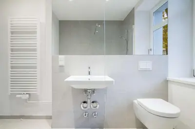 Ein Badezimmer in der Unterkunft HolidayHome Apartments I Cozy Private Room