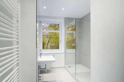 Ein Badezimmer in der Unterkunft HolidayHome Apartments I Cozy Private Room