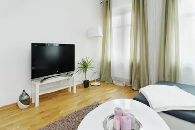 TV/Unterhaltungsangebot in der Unterkunft Great Central City Apartments Mitte Rosenthaler Platz