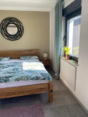 Ein Bett oder Betten in einem Zimmer der Unterkunft Ferienhaus am Schwielochsee