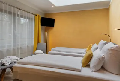 Ein Bett oder Betten in einem Zimmer der Unterkunft Ferienhaus Milchstraße mit Sternenblick
