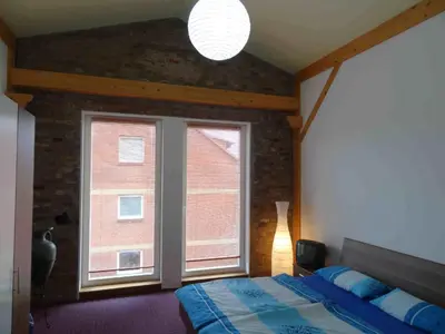 Ein Bett oder Betten in einem Zimmer der Unterkunft Nitschke 