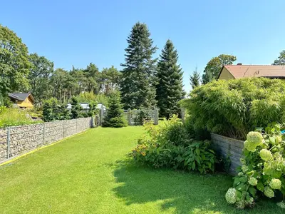 Ein Garten an der Unterkunft Ferienbungalow Kräuterhexxe