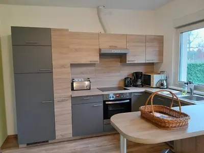 Küche/Küchenzeile in der Unterkunft Ferienbungalow Kräuterhexxe