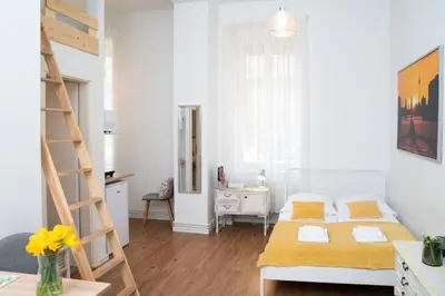 Ein Bett oder Betten in einem Zimmer der Unterkunft Green Apartment Studio for 3