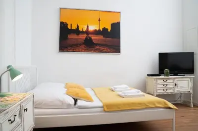 Ein Bett oder Betten in einem Zimmer der Unterkunft Green Apartment Studio for 3