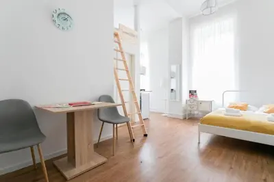 Ein Bett oder Betten in einem Zimmer der Unterkunft Green Apartment Studio for 3