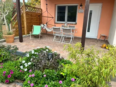 Ein Garten an der Unterkunft Ferienwohnung 2 Km an der A9 nähe Potsdam Berlin