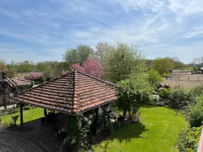 Ein Garten an der Unterkunft Ferienwohnung 2 Km an der A9 nähe Potsdam Berlin