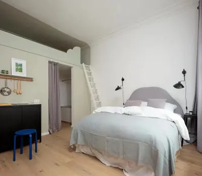 Ein Bett oder Betten in einem Zimmer der Unterkunft Berlin Suites & Residencies