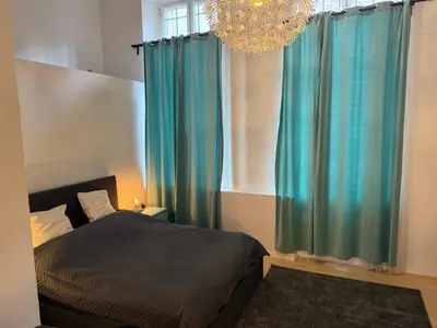 Ein Bett oder Betten in einem Zimmer der Unterkunft Entspanntes Apartment Wilmersdorf
