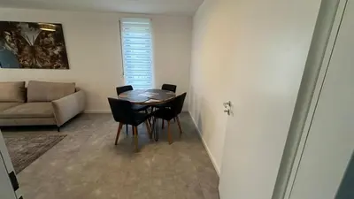 Ein Sitzbereich in der Unterkunft Ruhige Wohnung mit Garten