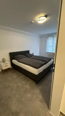 Ein Bett oder Betten in einem Zimmer der Unterkunft Möbliertes Apartment in Berlin Schönefeld
