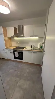 Küche/Küchenzeile in der Unterkunft Möbliertes Apartment in Berlin Schönefeld
