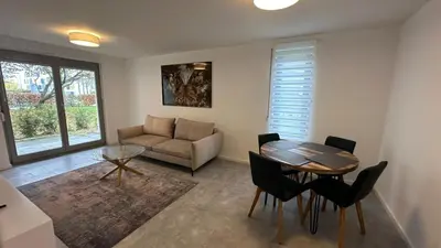 Ein Sitzbereich in der Unterkunft Möbliertes Apartment in Berlin Schönefeld