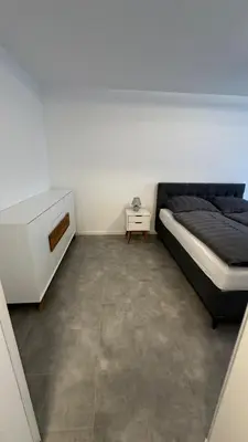 Ein Bett oder Betten in einem Zimmer der Unterkunft Möbliertes Apartment in Berlin Schönefeld