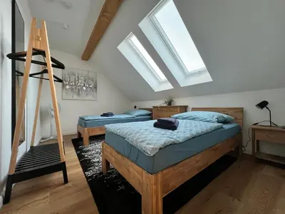 Ein Bett oder Betten in einem Zimmer der Unterkunft BrandenburgApartment-Sky