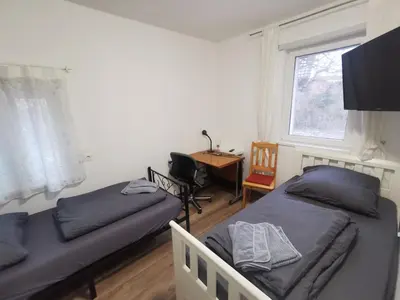 Ein Bett oder Betten in einem Zimmer der Unterkunft Monteur-Haus Grüber Berlin Marzan, Hellersdorf, Lichtenberg