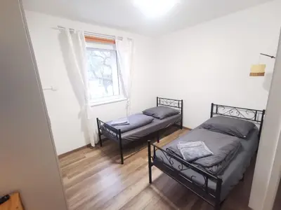 Ein Bett oder Betten in einem Zimmer der Unterkunft Monteur-Haus Grüber Berlin Marzan, Hellersdorf, Lichtenberg