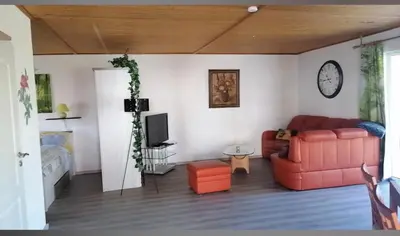Ein Sitzbereich in der Unterkunft Ferienhaus am See