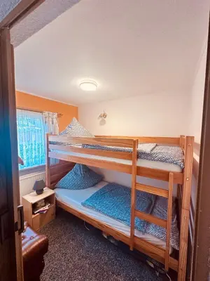 Ein Bett oder Betten in einem Zimmer der Unterkunft Ferienwohnung Nettelbeck