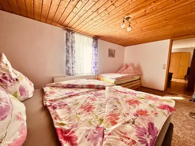 Ein Bett oder Betten in einem Zimmer der Unterkunft Ferienwohnung Nettelbeck