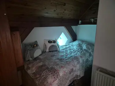 Ein Bett oder Betten in einem Zimmer der Unterkunft Ferienwohnung am See