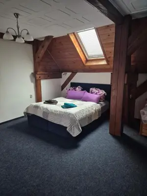 Ein Bett oder Betten in einem Zimmer der Unterkunft Ferienwohnung am See