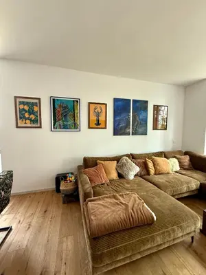 Ein Sitzbereich in der Unterkunft Bad Seerose mit Seeblick, Dachterrasse, Pool und Sauna