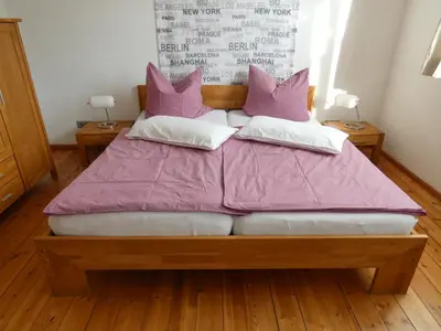 Ein Bett oder Betten in einem Zimmer der Unterkunft Ferienwohnung in Berlin-Grünau, Wasser- und Waldnähe, gute Verkehrsanbindung