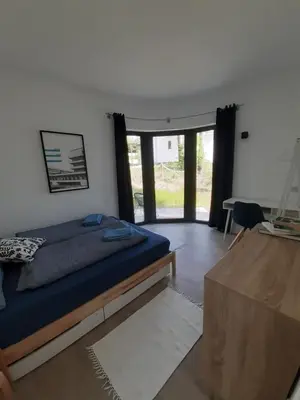 Ein Bett oder Betten in einem Zimmer der Unterkunft Ihre Auszeit am See