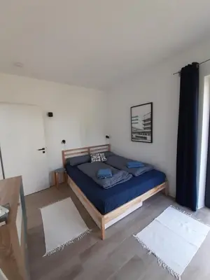 Ein Bett oder Betten in einem Zimmer der Unterkunft Ihre Auszeit am See