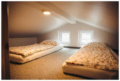 Ein Bett oder Betten in einem Zimmer der Unterkunft Ferienhaus in See nähe