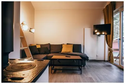 Ein Sitzbereich in der Unterkunft Ferienhaus in See nähe