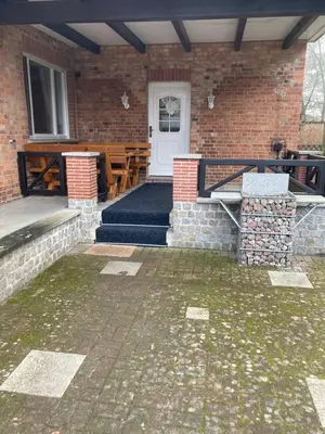 Ein Sitzbereich in der Unterkunft Ferienwohnung am Waldesrand