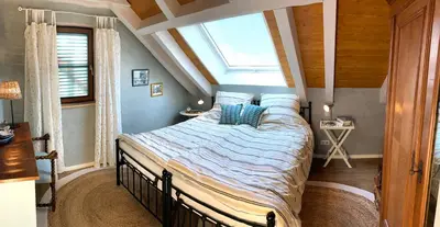 Ein Bett oder Betten in einem Zimmer der Unterkunft Apartment in Caputh am Schlosspark
