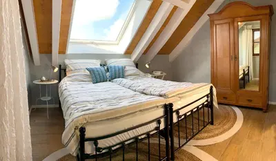 Ein Bett oder Betten in einem Zimmer der Unterkunft Apartment in Caputh am Schlosspark