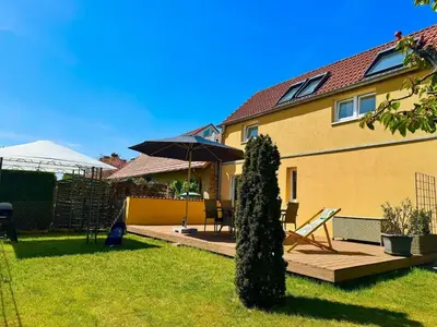 Ein Garten an der Unterkunft Ferienhaus Havelzeit in Werder an der Havel