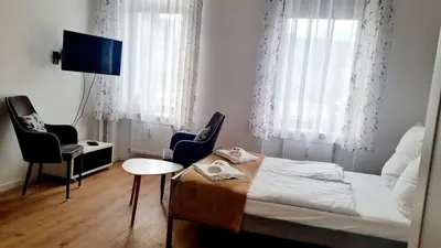 Ein Bett oder Betten in einem Zimmer der Unterkunft Green Apartment Fine for couples Neukölln