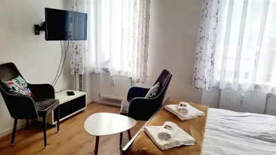 Ein Bett oder Betten in einem Zimmer der Unterkunft Green Apartment Fine for couples Neukölln