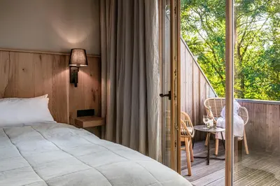 Ein Bett oder Betten in einem Zimmer der Unterkunft Landhaus 1736