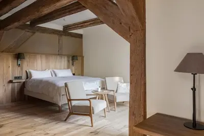 Ein Bett oder Betten in einem Zimmer der Unterkunft Landhaus 1736
