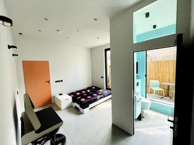 Ein Bett oder Betten in einem Zimmer der Unterkunft Room with a bathroom and private entrance door