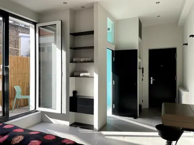 Ein Bett oder Betten in einem Zimmer der Unterkunft Room with a bathroom and private entrance door