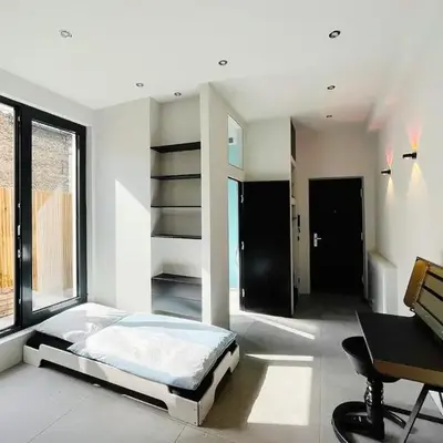 Room with a bathroom and private entrance door