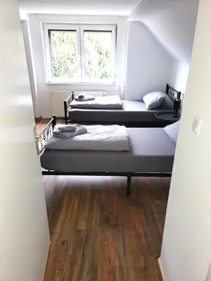 Ein Bett oder Betten in einem Zimmer der Unterkunft Monteur-Haus Heinrich Berlin Marzahn, Hellersdorf, Lichtenberg