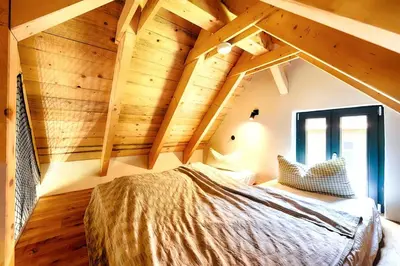Ein Bett oder Betten in einem Zimmer der Unterkunft Refugium im Wald