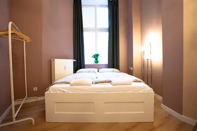 Ein Bett oder Betten in einem Zimmer der Unterkunft Atelier Centrál